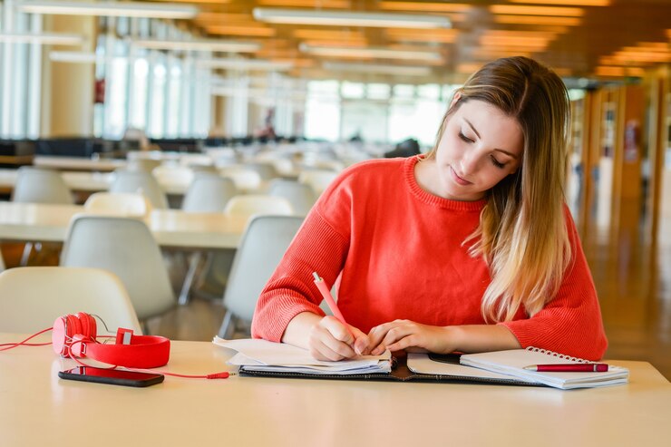 portrait-young-student-studying-university-library-education-lifestyle-concept_58466-12288